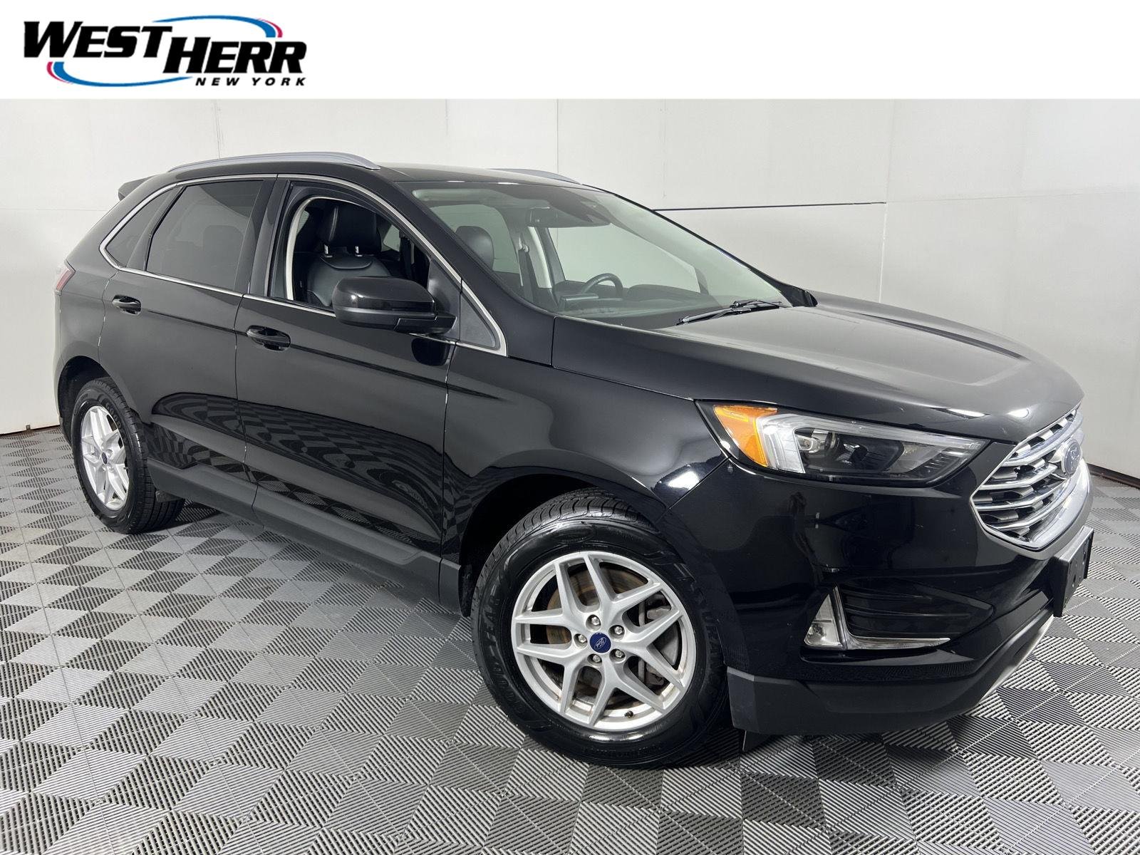Used 2022 Agate Black Ford SEL image 1