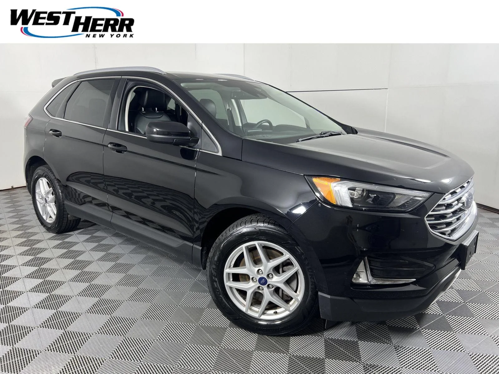 Used 2022 Agate Black Ford SEL image 1