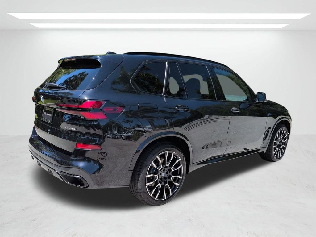 New 2026 Black Sapphire Metallic BMW xDrive40i image 4