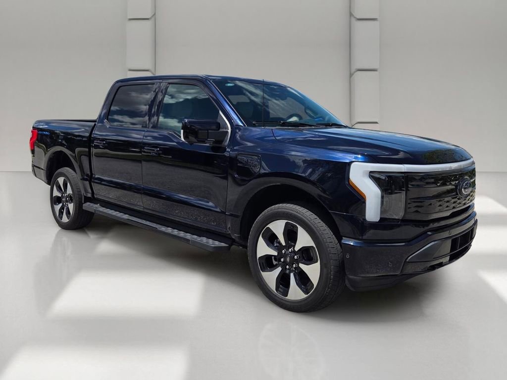 Used 2023 Ford F-150 Lightning Platinum with VIN 1FT6W1EV1PWG13979 for sale in West Palm Beach, FL