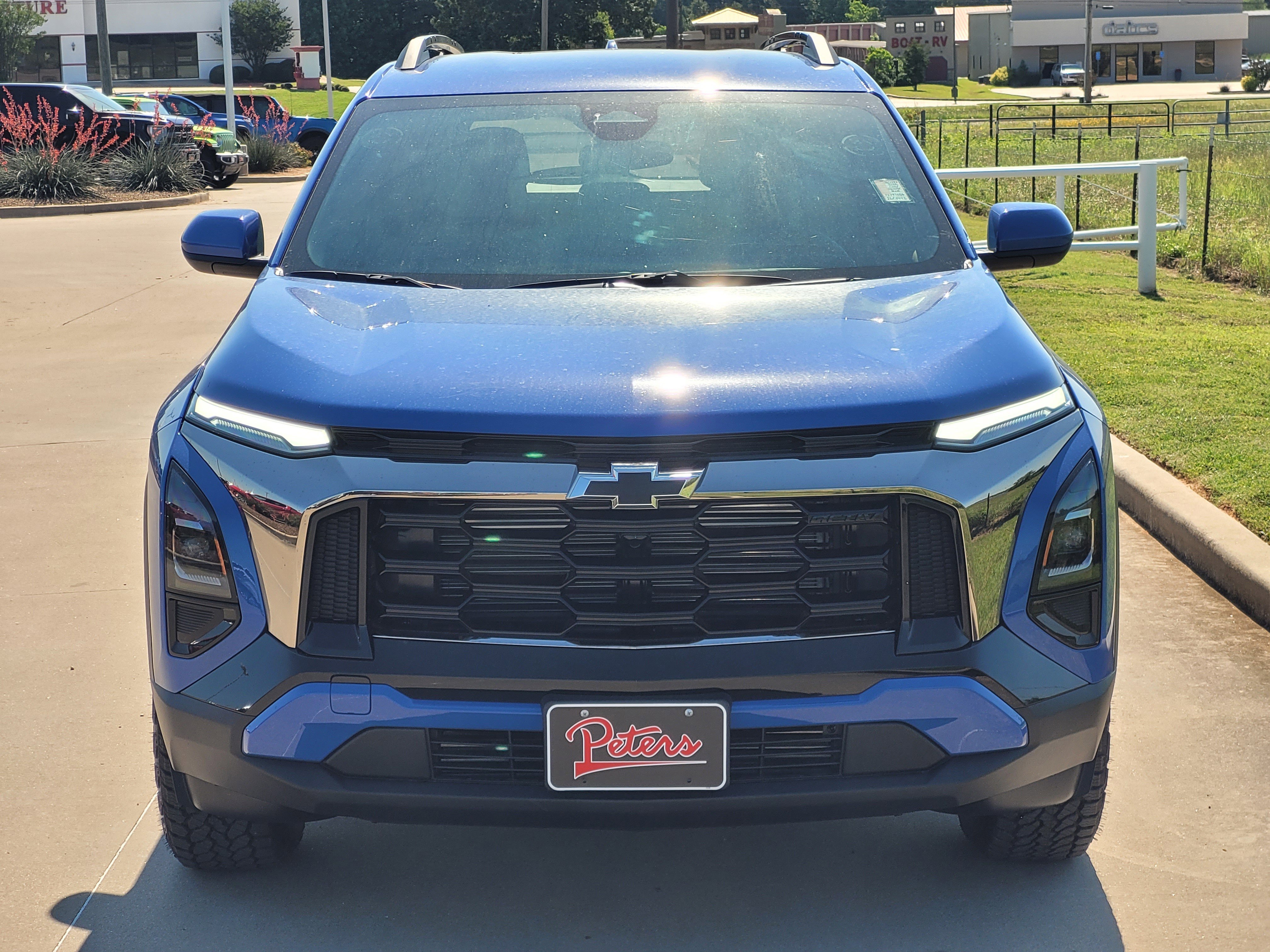New 2026 Reef Blue Metallic Chevrolet AWD ACTIV image 2
