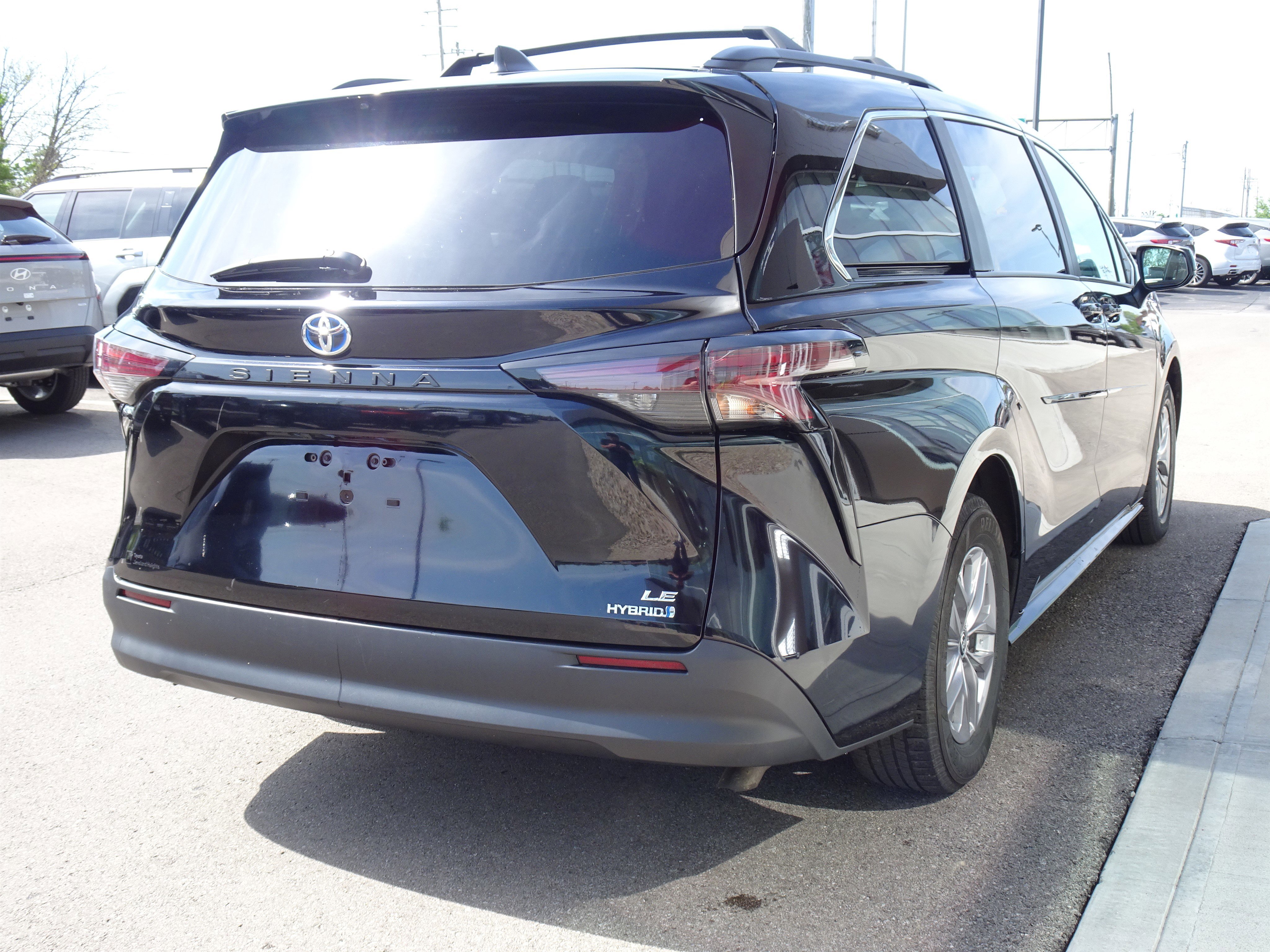 Used 2024 Midnight Black Metallic Toyota LE image 5