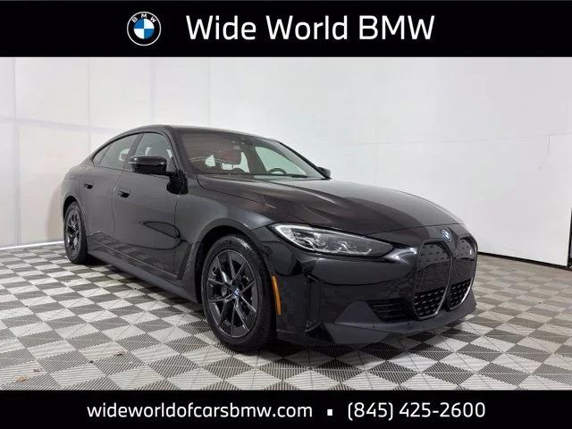 Used 2024 Black BMW xDrive40 image 1