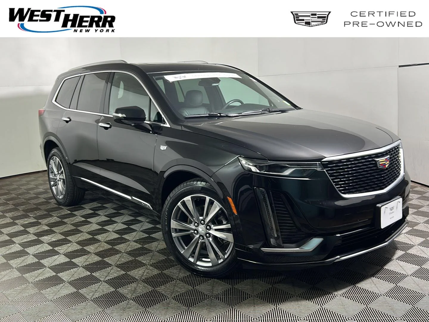 Used 2024 Stellar Black Metallic Cadillac AWD Premium Luxury image 1