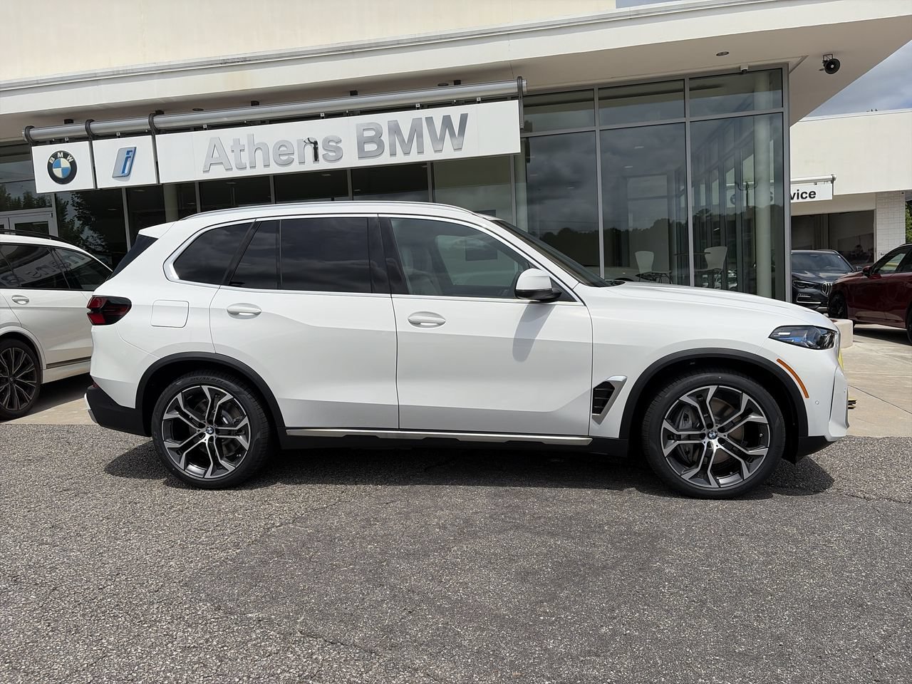 New 2026 Alpine White BMW xDrive50e image 9