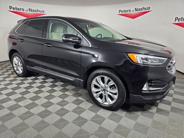 Used 2020 Black Ford Titanium image 1