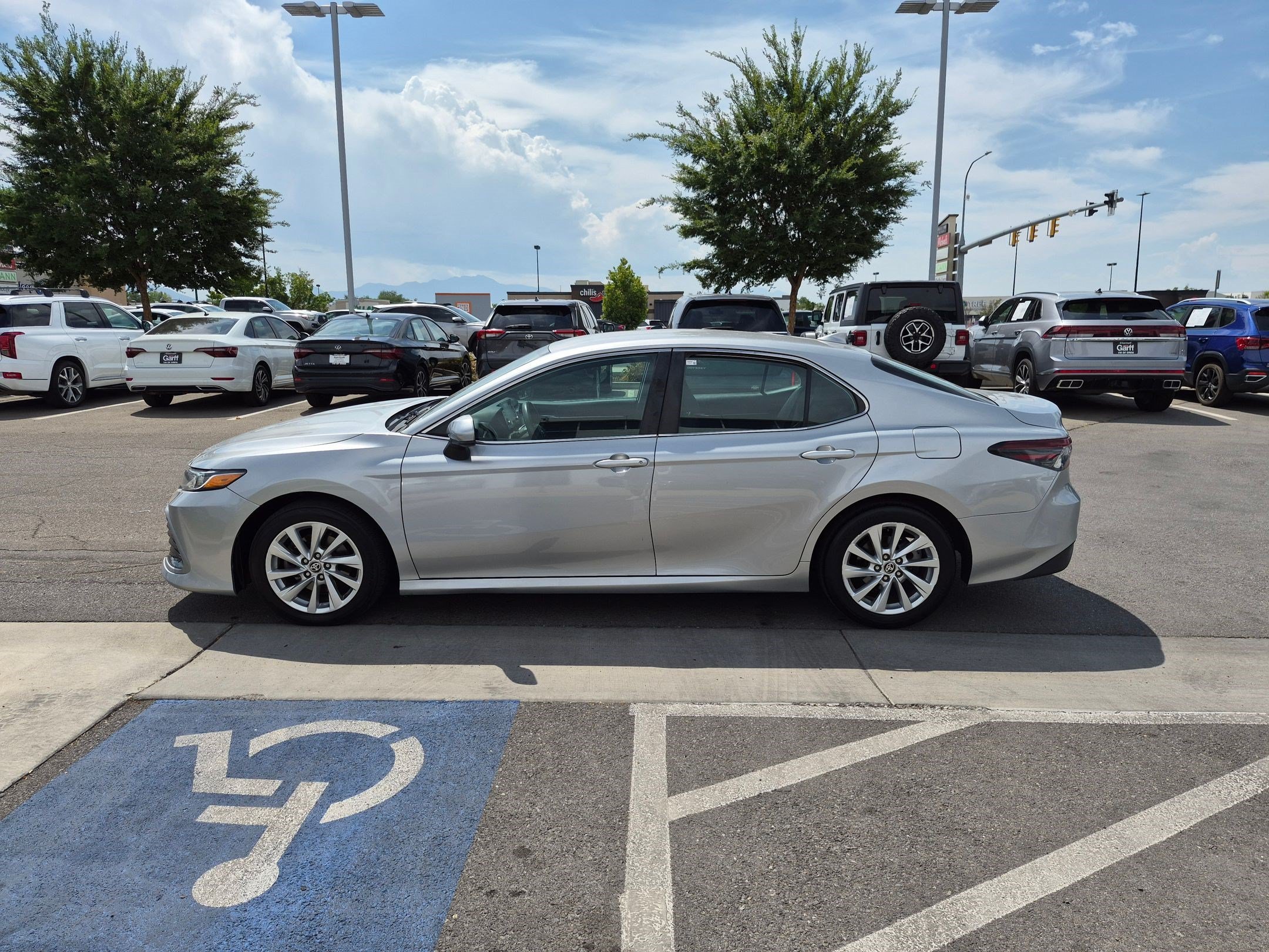 Used 2021 Celestial Silver Metallic Toyota LE image 6