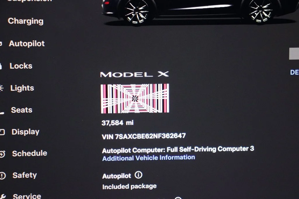 Used 2022 Solid Black Tesla Plaid image 25