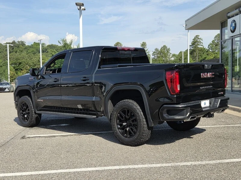 Used 2024 Onyx Black GMC 4WD CREW CAB 147" AT4 image 3