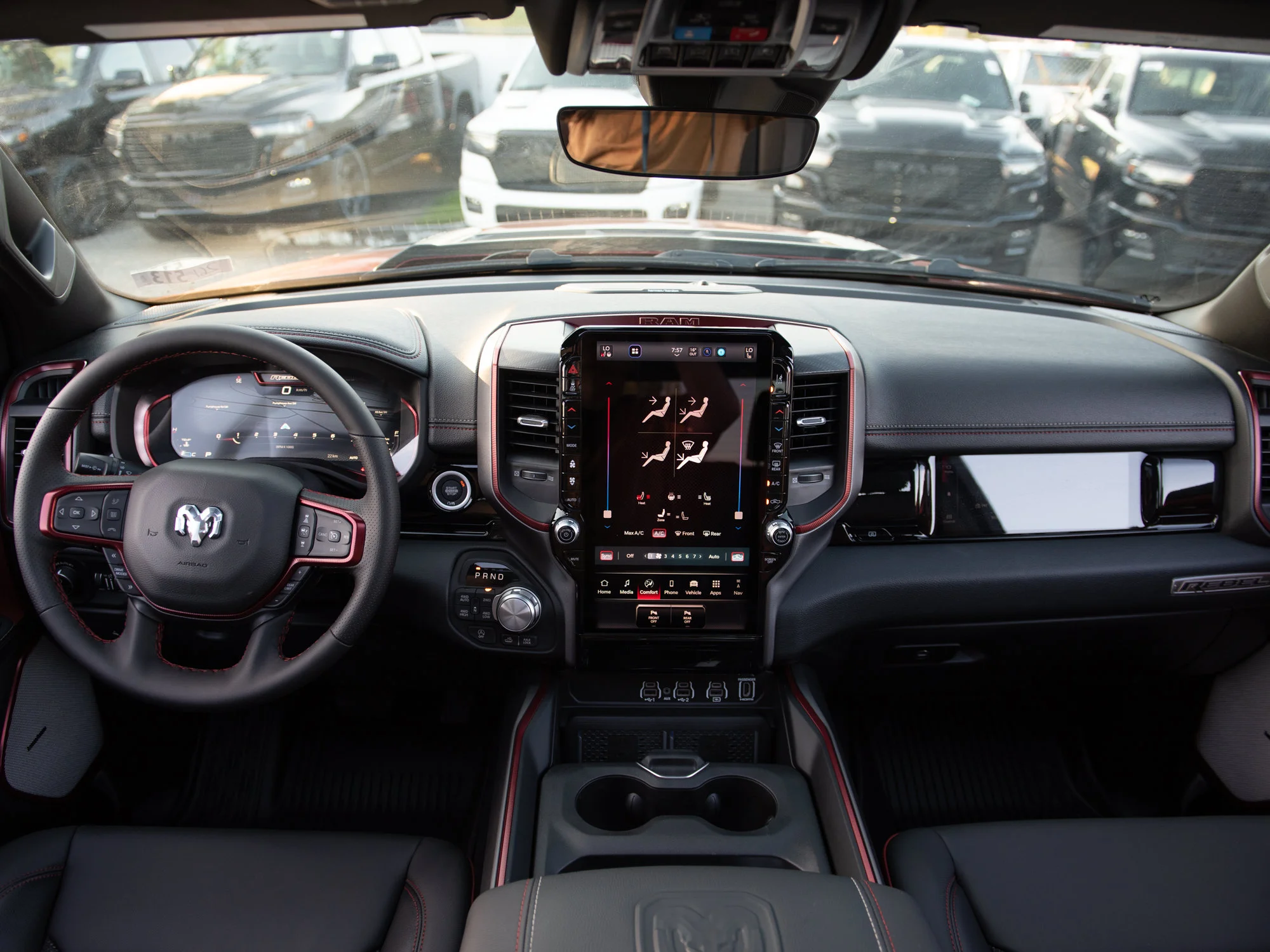 New 2026 Red RAM Rebel* Crew Cab 4x4, Pano Sunroof, 33 Inch A/T Tires, Passenger Screen image 12