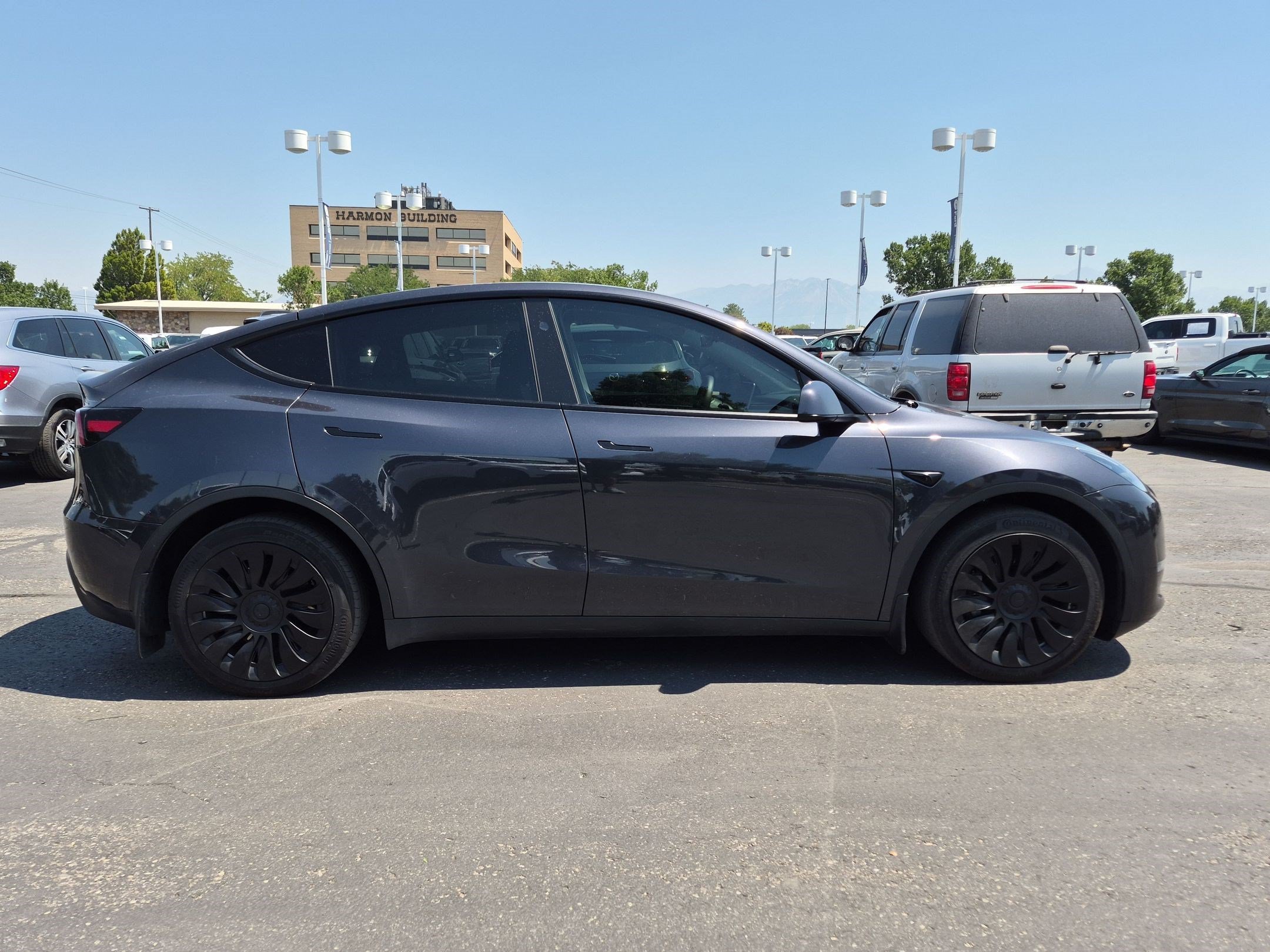 Certified 2024 Tesla Model Y Long Range with VIN 7SAYGDEE4RF072427 for sale in West Valley City, UT