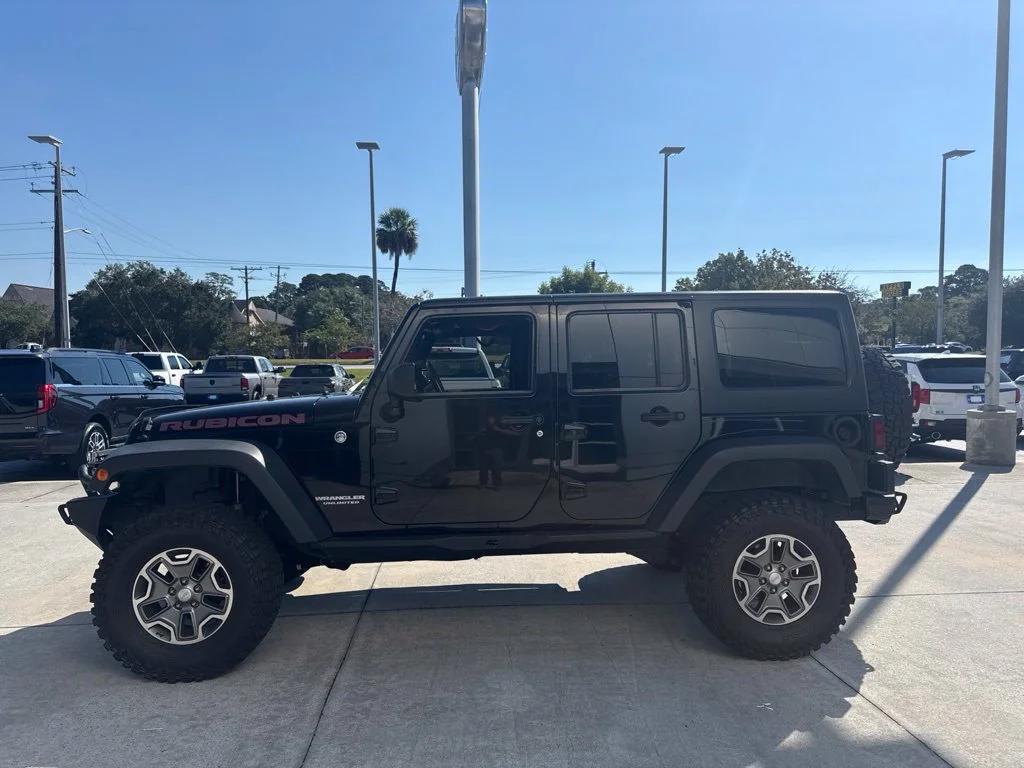 Used 2014 Black Clearcoat Jeep Unlimited Rubicon image 5