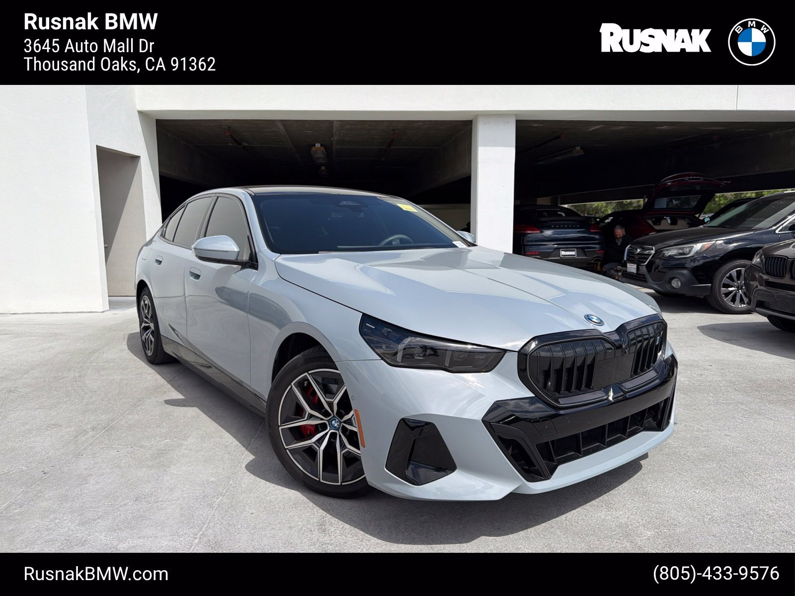 Used 2024 Brooklyn Gray Metallic BMW eDrive40 image 1