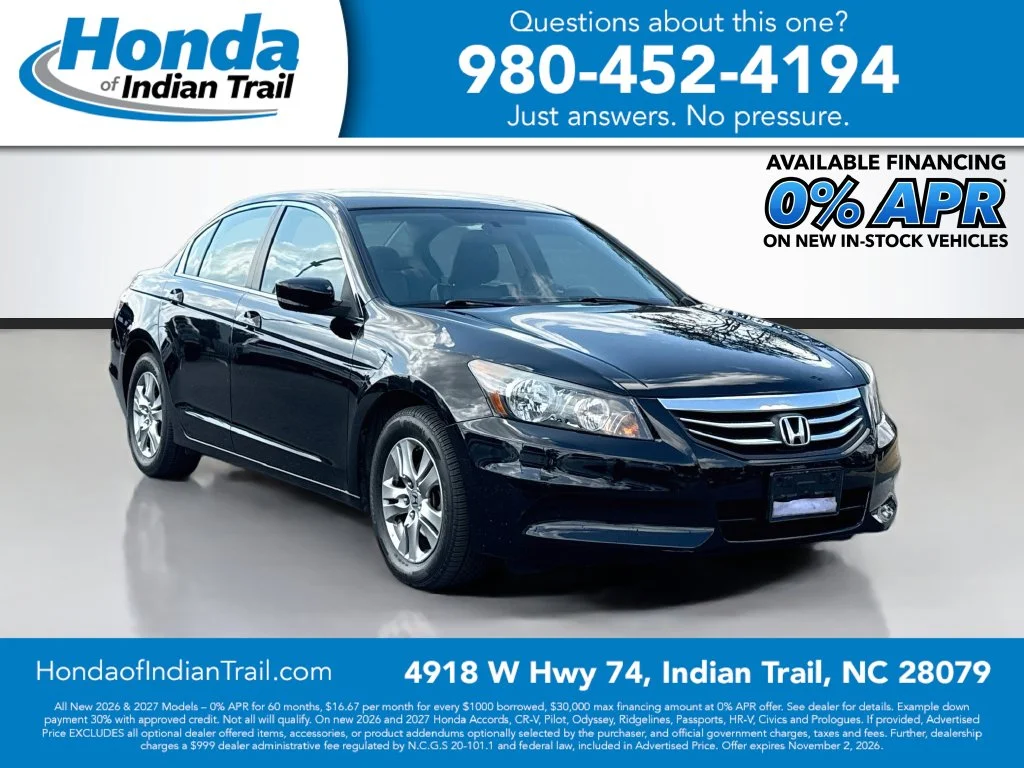 Used 2011 Crystal Black Pearl Honda SE image 1
