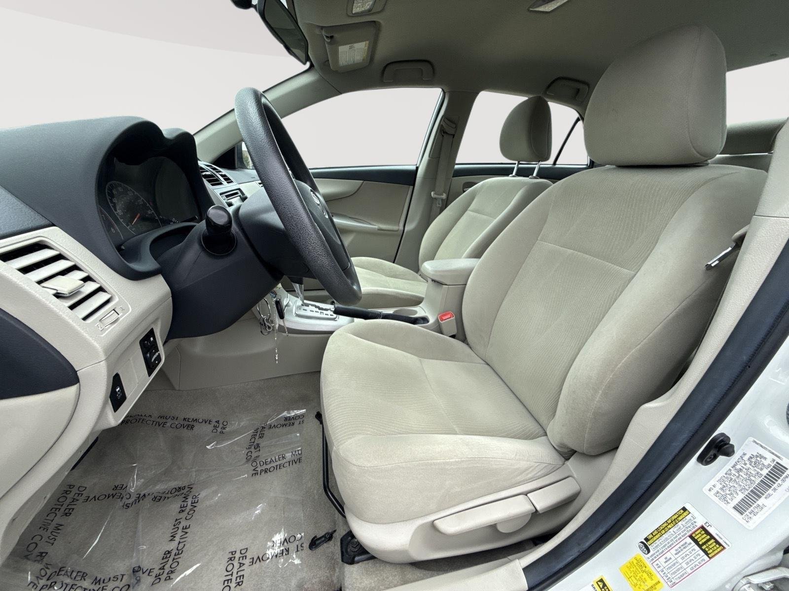 Used 2013 Super White Toyota LE image 3