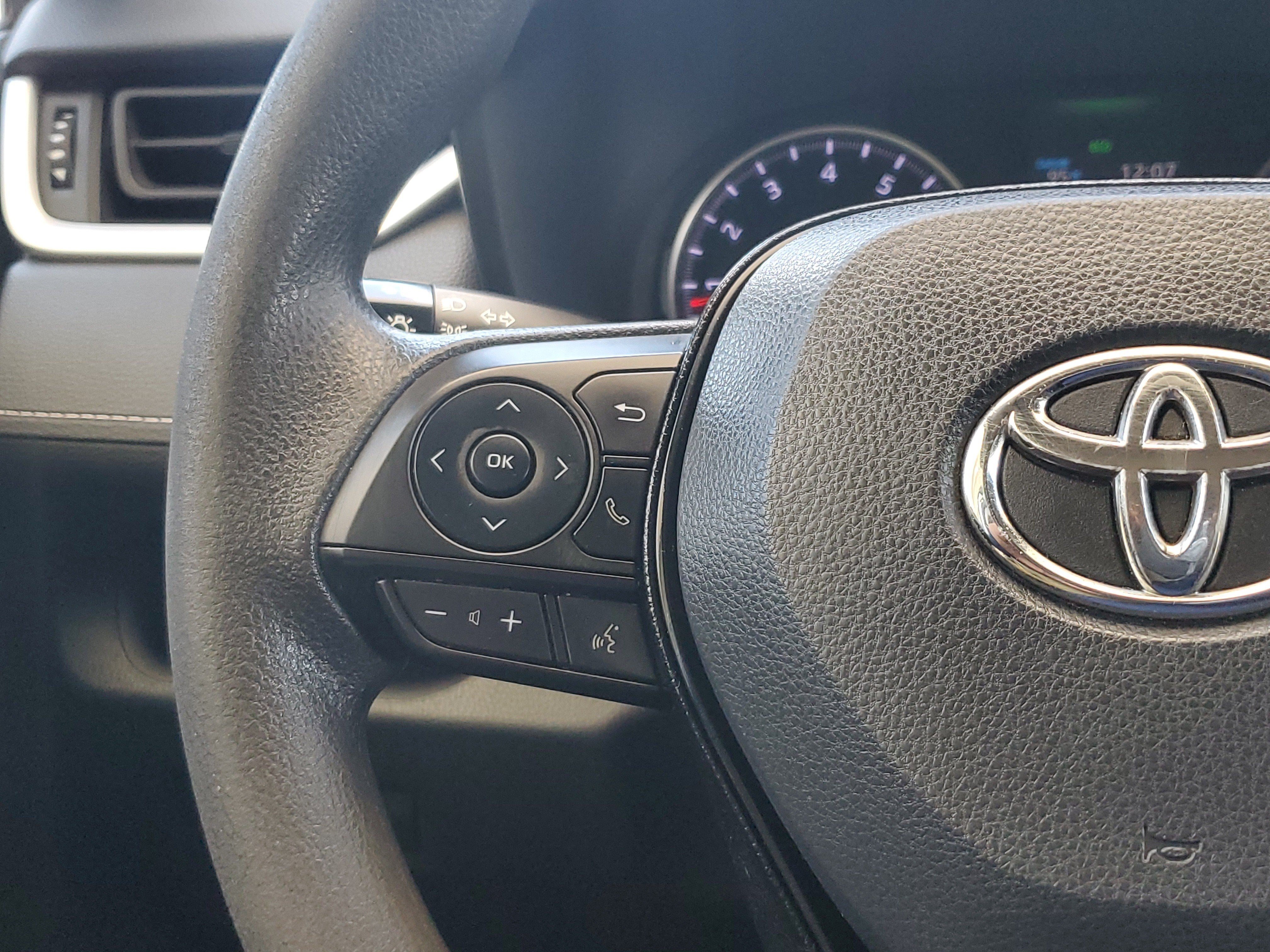 Used 2021 Super White Toyota LE image 22