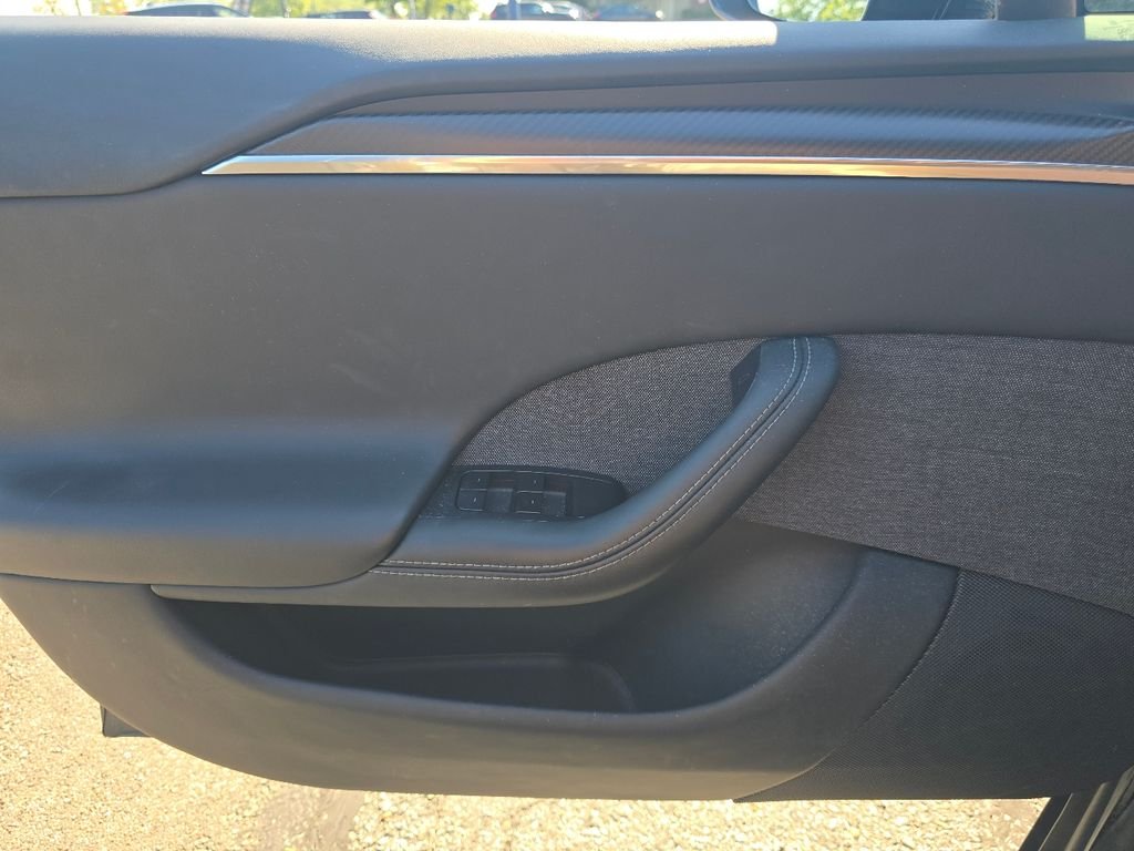 Used 2024 Solid Black Tesla Plaid image 21