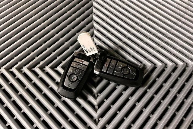 Used 2023 Agate Black Metallic Ford Limited image 10