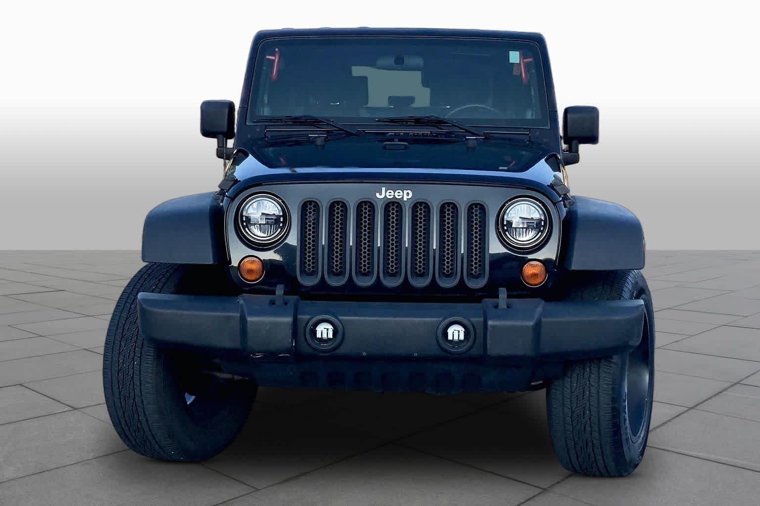 Used 2010 Black Jeep Sport image 3