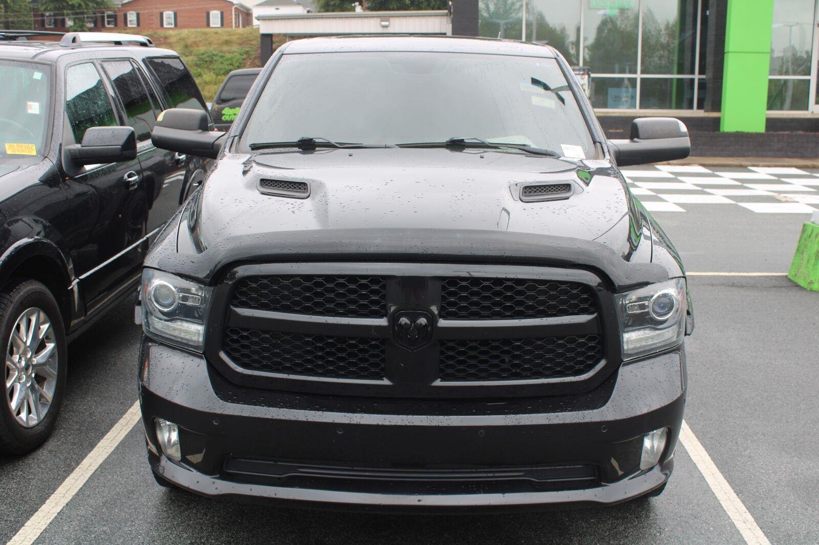 Used 2017 Brilliant Black Crystal Pearlcoat Ram Night image 2