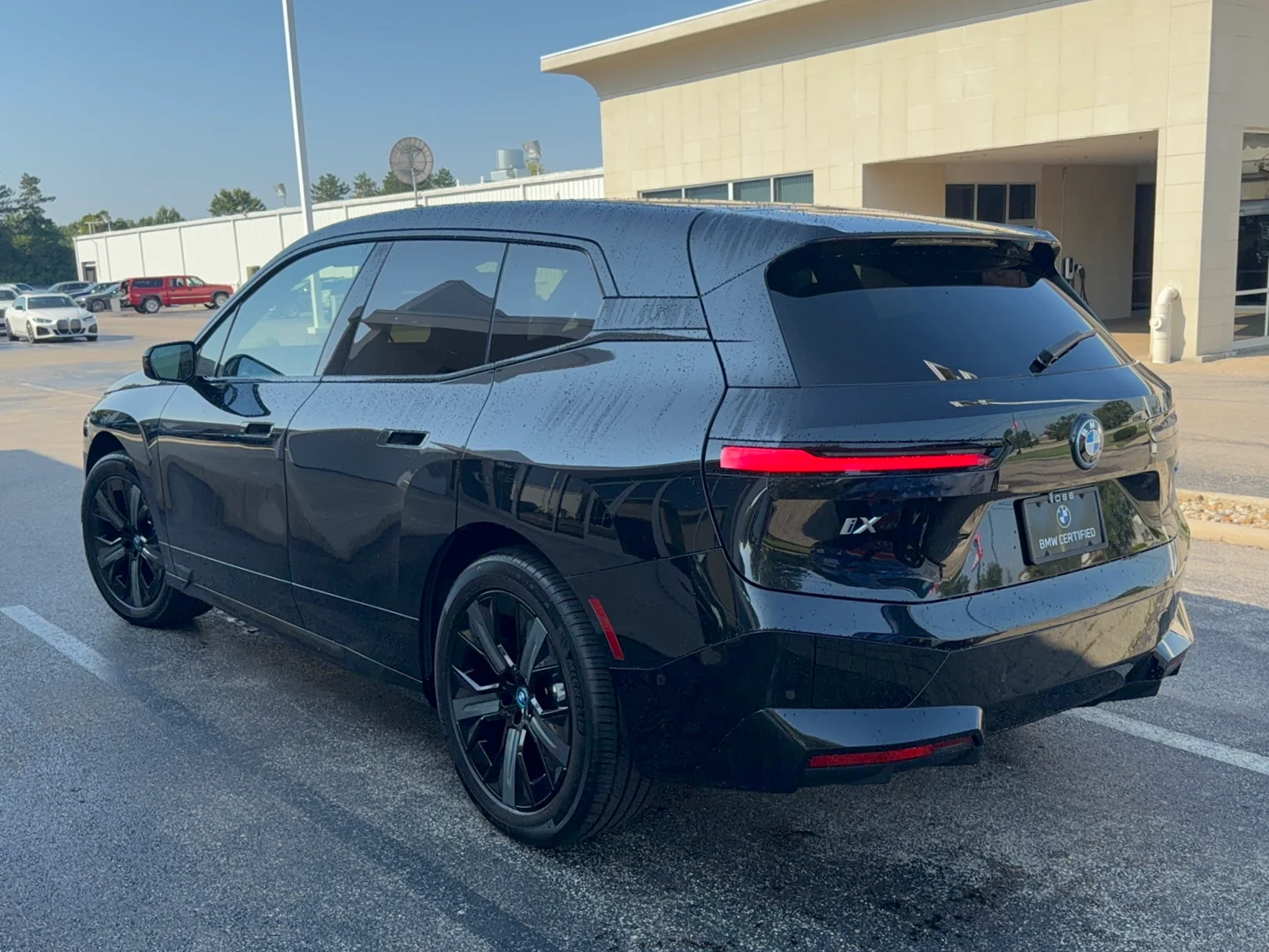 Certified Used 2024 Black Sapphire Metallic BMW xDrive50 image 6