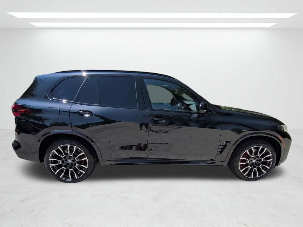 New 2026 Black Sapphire Metallic BMW xDrive40i image 3