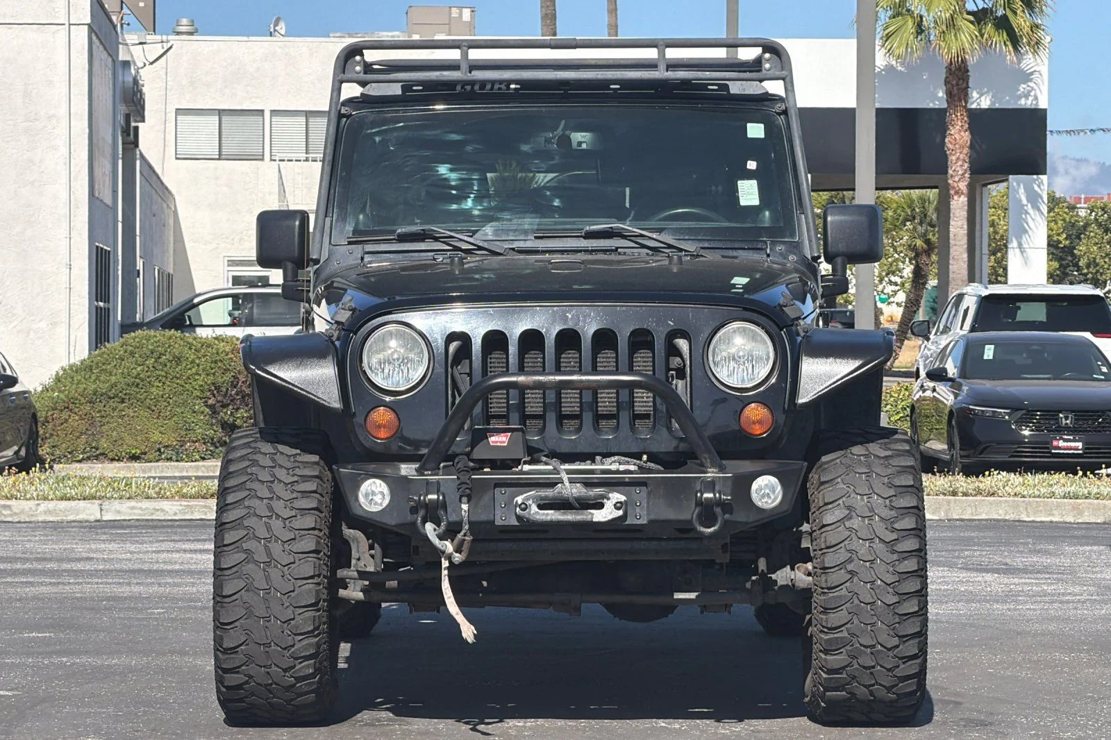 Used 2013 Black Jeep Unlimited Sport image 10