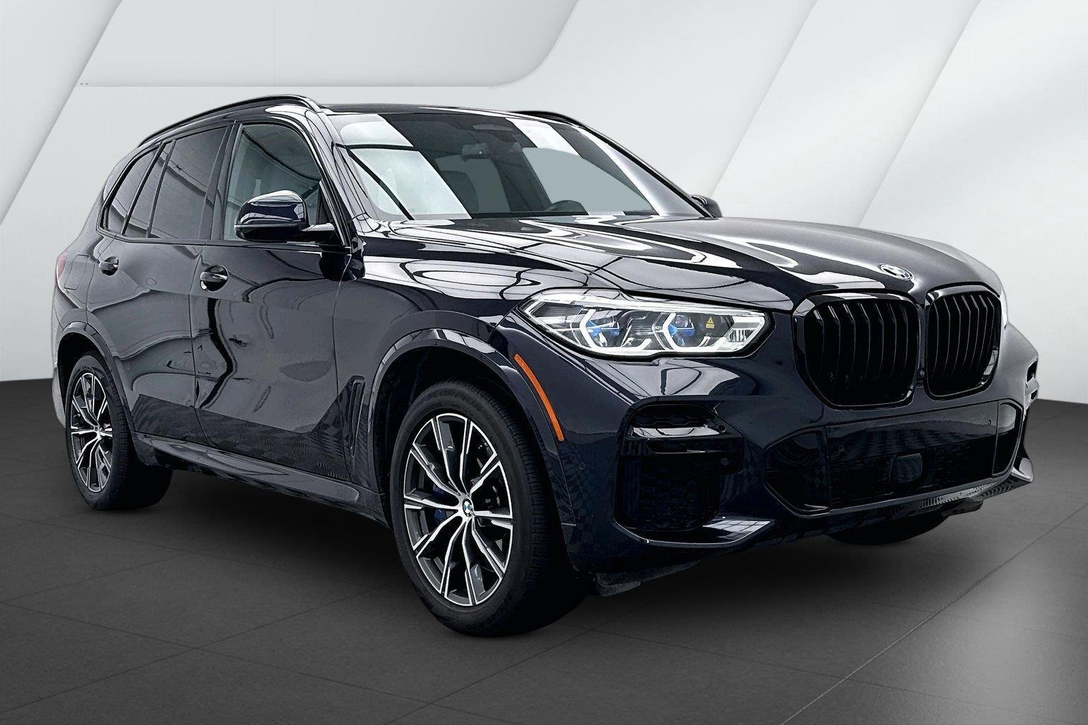Certified Used 2023 Carbon Black Metallic BMW M50i image 1