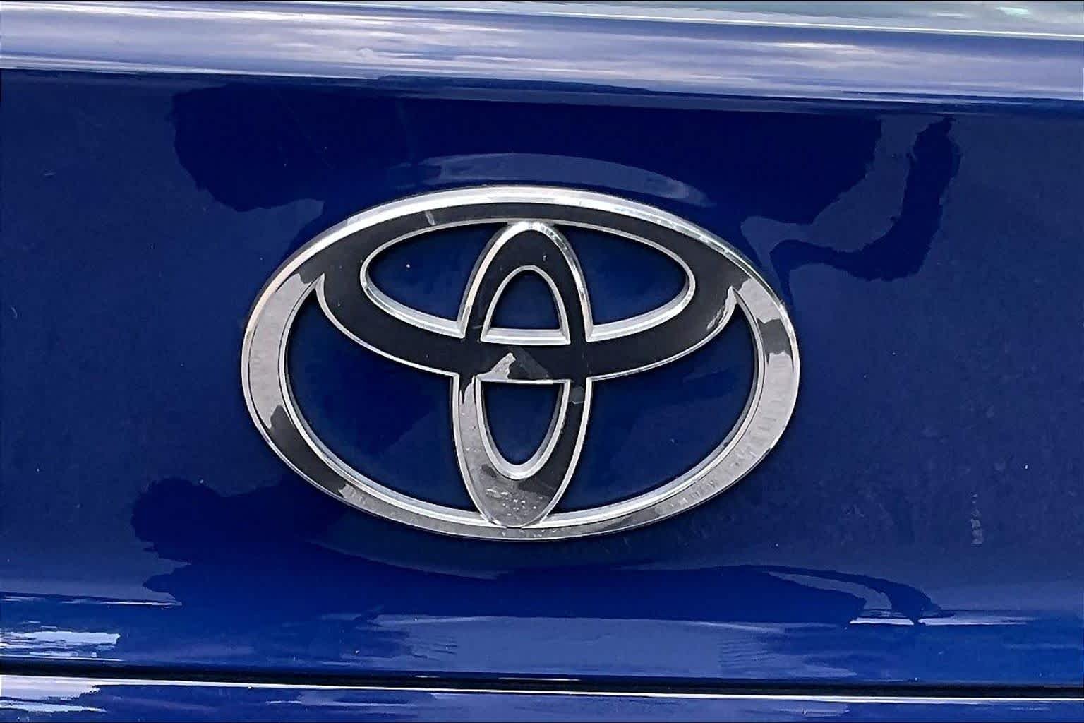 Used 2025 Reservoir Blue Toyota LE image 31