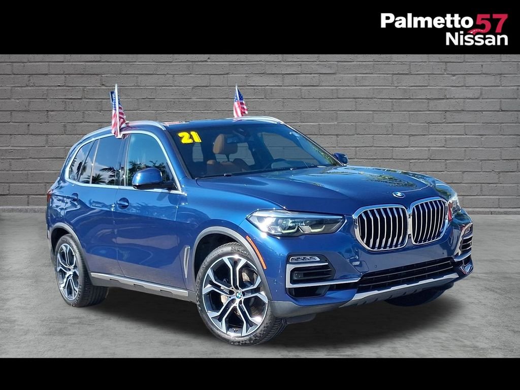 Used 2021 Blue BMW sDrive40i image 1