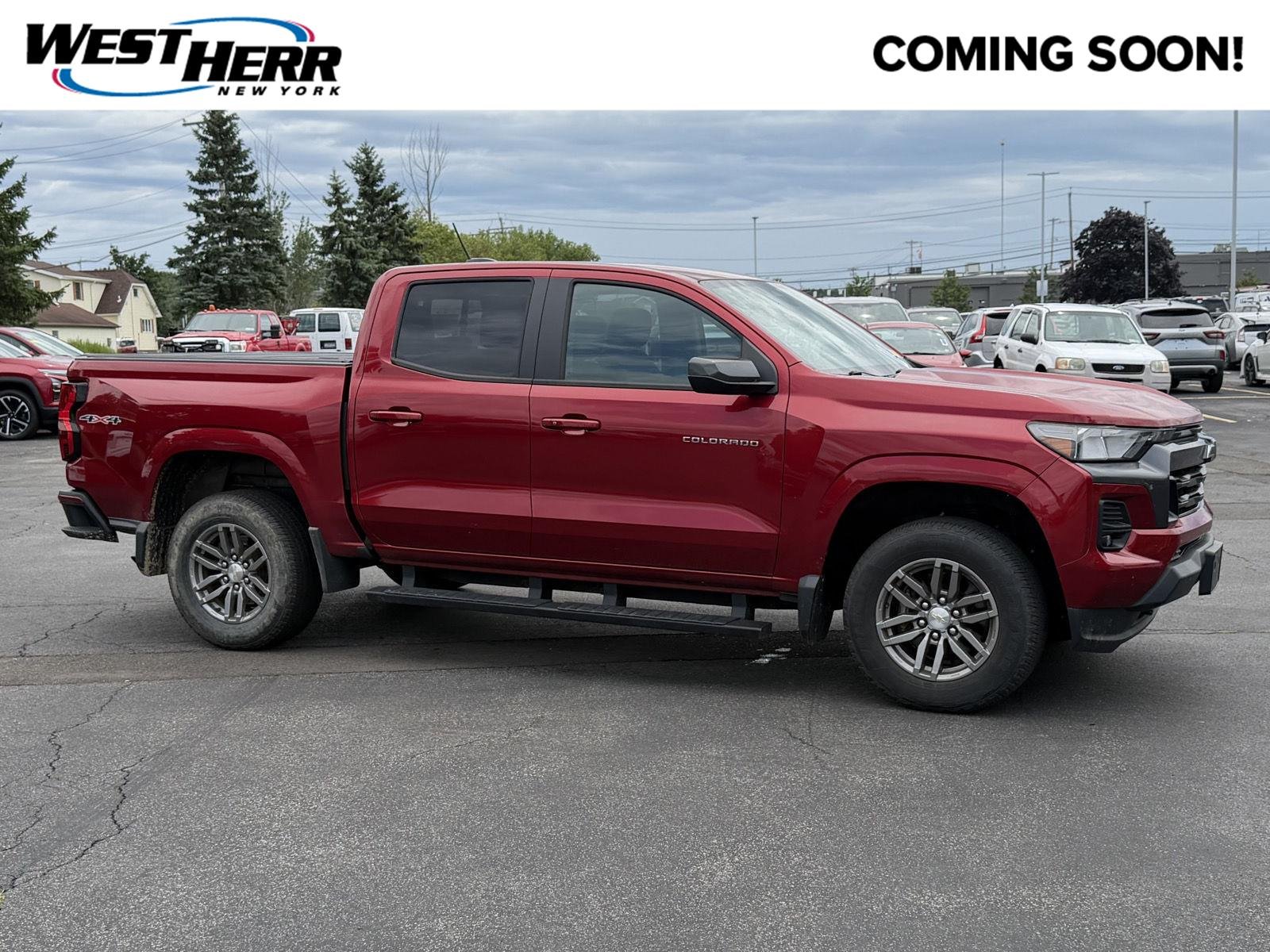 Used 2023 Radiant Red Tintcoat Chevrolet 4WD LT image 1