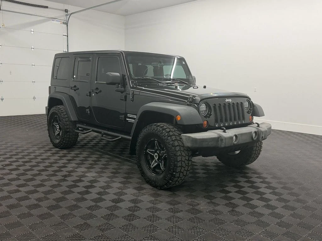 Used 2012 Black Jeep Sport image 6