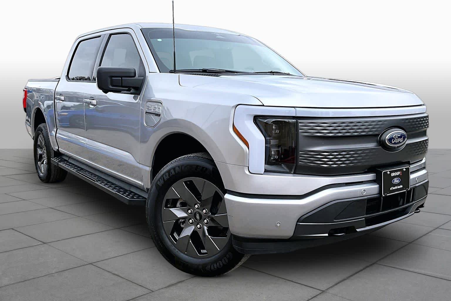 Certified 2023 Ford F-150 Lightning XLT with VIN 1FT6W1EV5PWG36956 for sale in Austin, TX