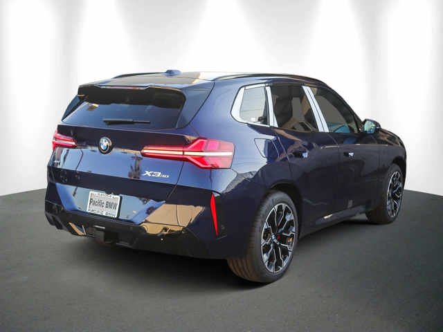 Used 2026 Tanzanite Blue II Metallic BMW 30 xDrive image 6