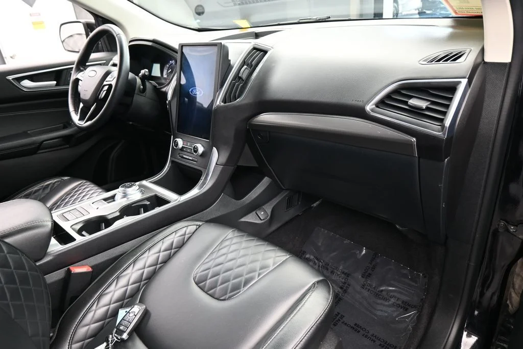Used 2024 Black Metallic Ford Titanium image 48
