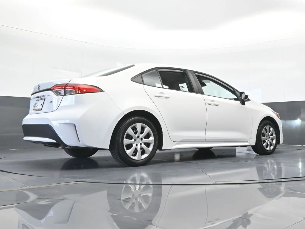 Used 2021 Super White Toyota LE image 49