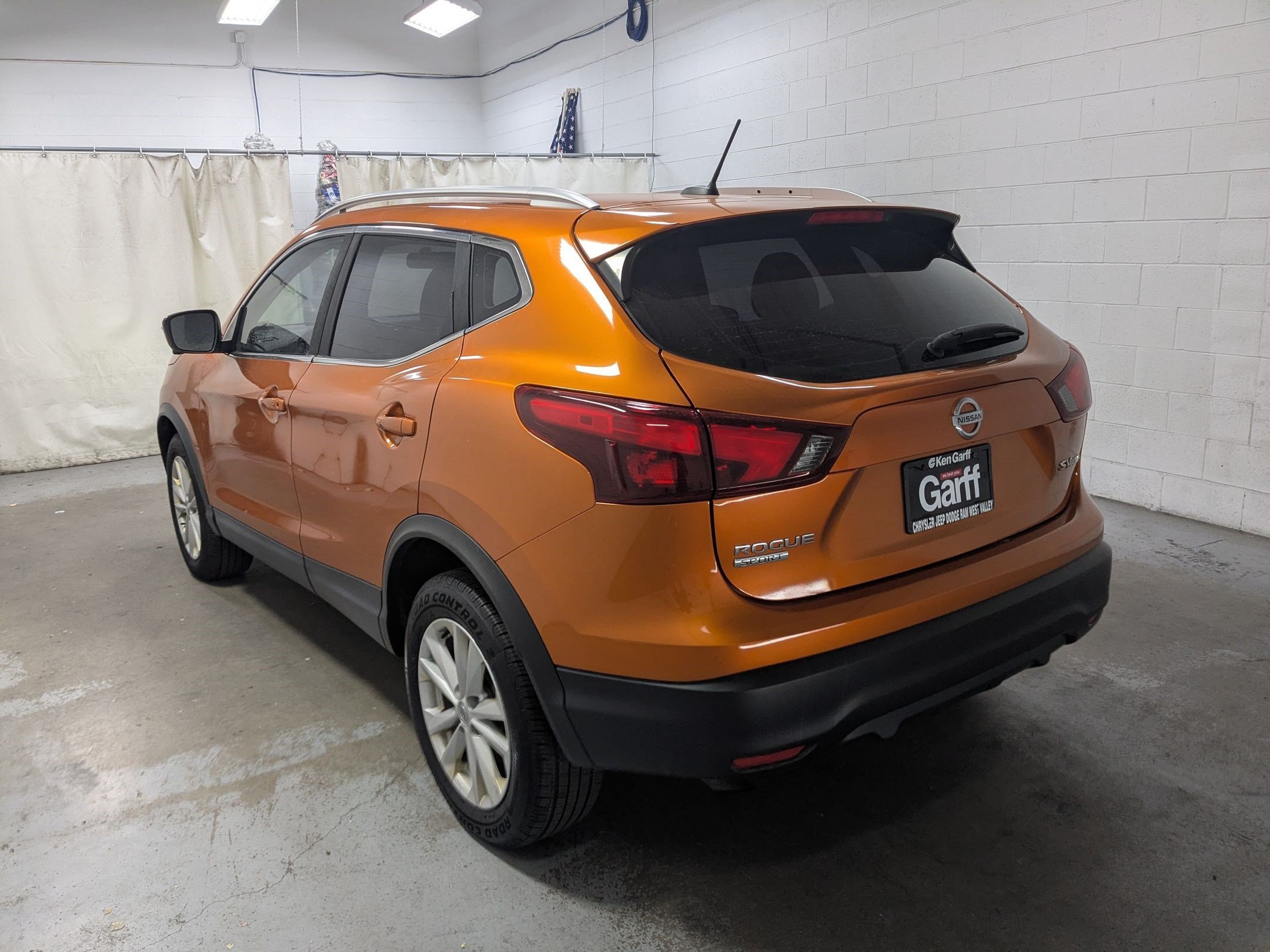 Used 2017 Monarch Orange Nissan SV image 7