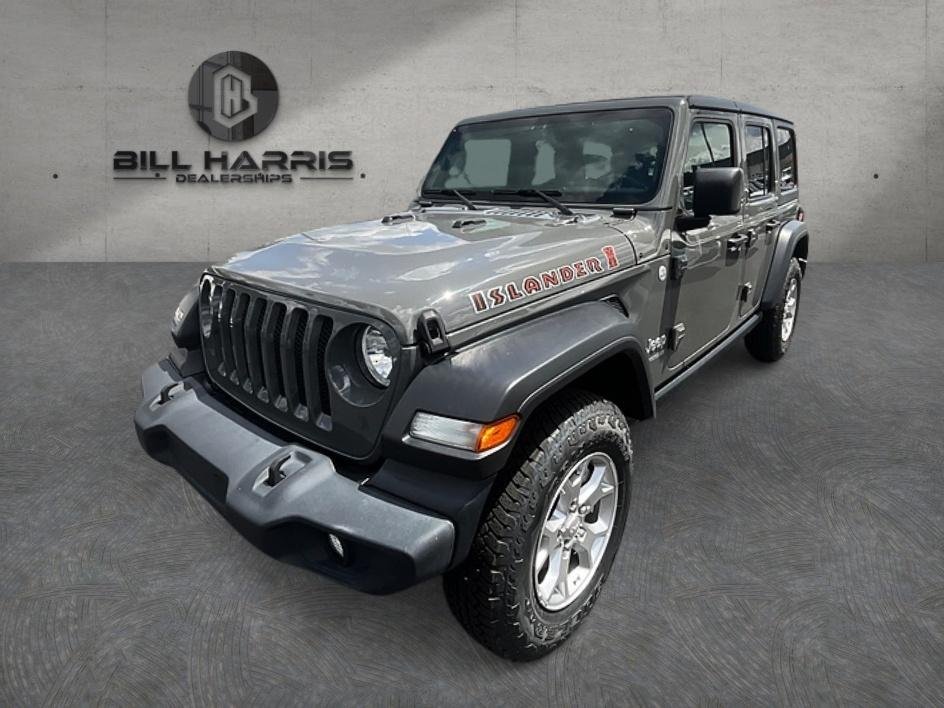 Used 2021 Gray Jeep Unlimited Sport image 1