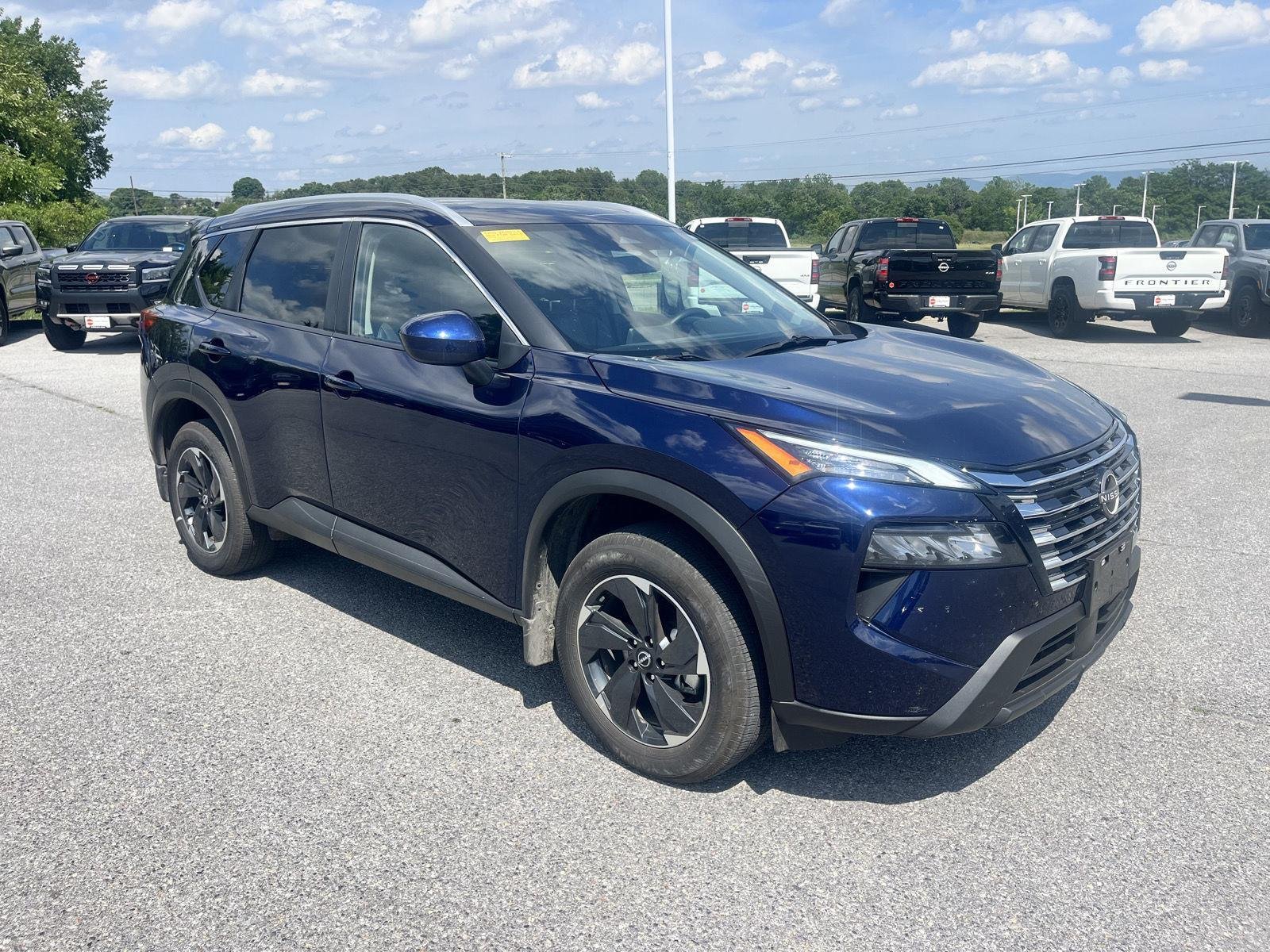 Used 2025 Deep Ocean Blue Pearl Nissan SV image 1