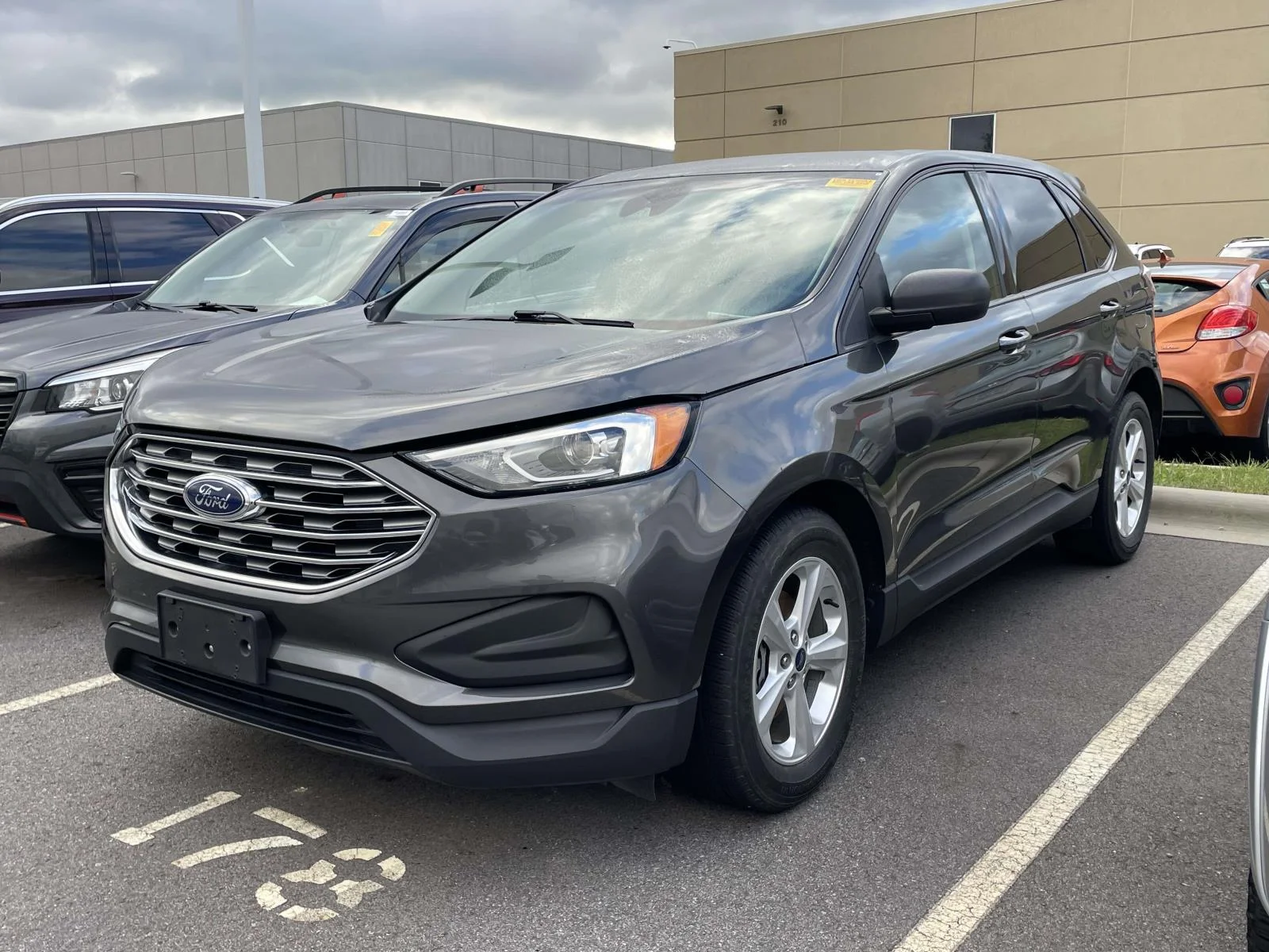 Used 2020 Magnetic Metallic Ford SE image 2
