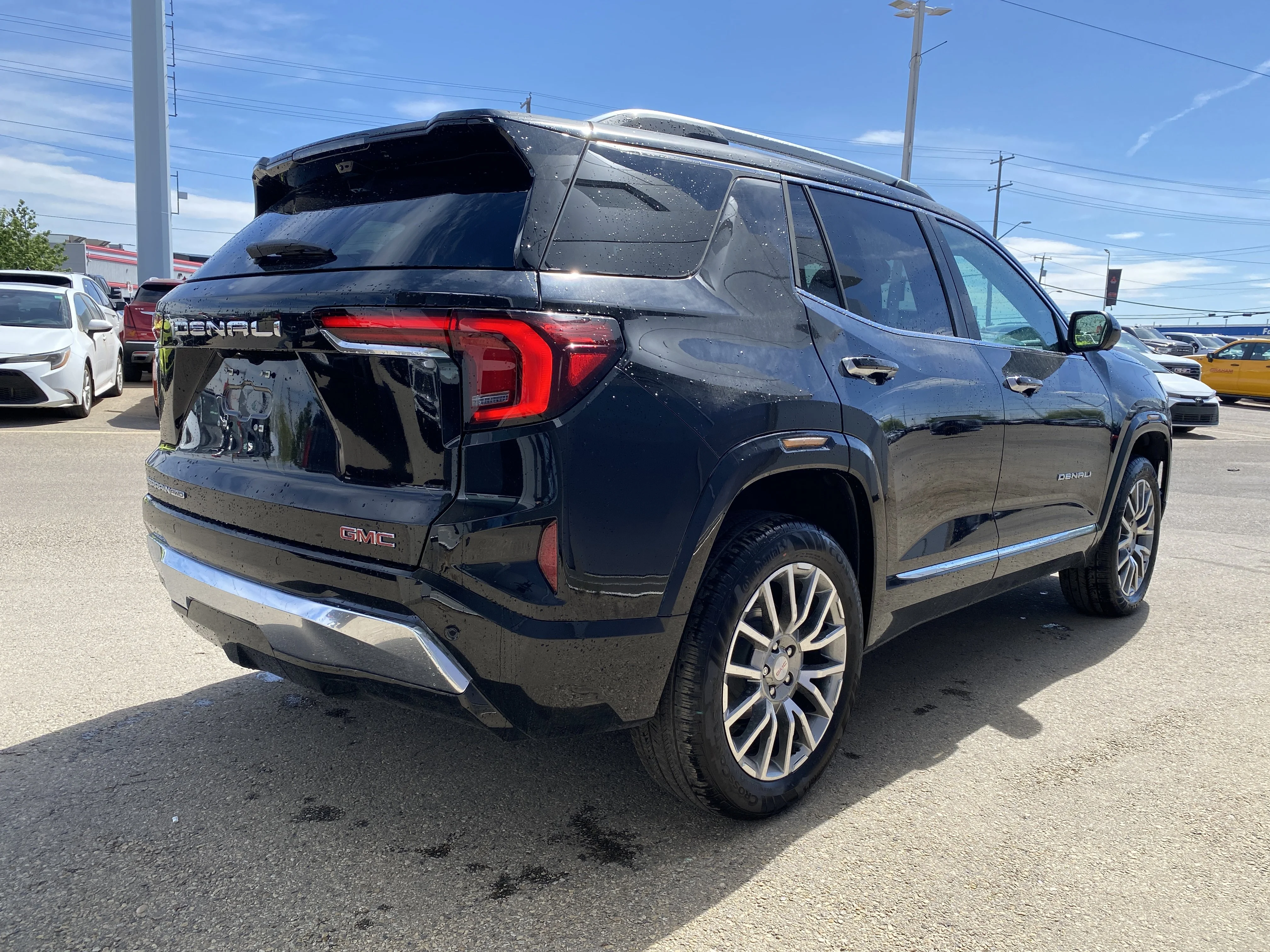 New 2026 EBONY TWILIGHT METALLIC GMC AWD Denali image 7