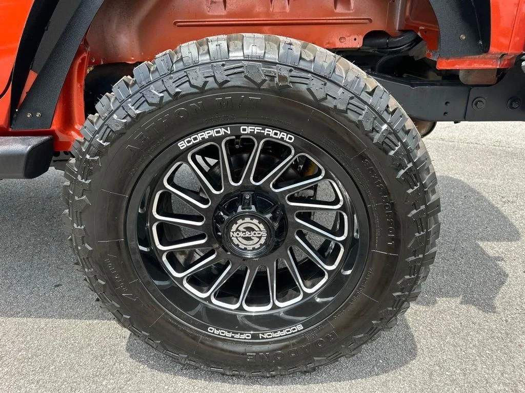 Used 2009 Orange Jeep Unlimited X image 12