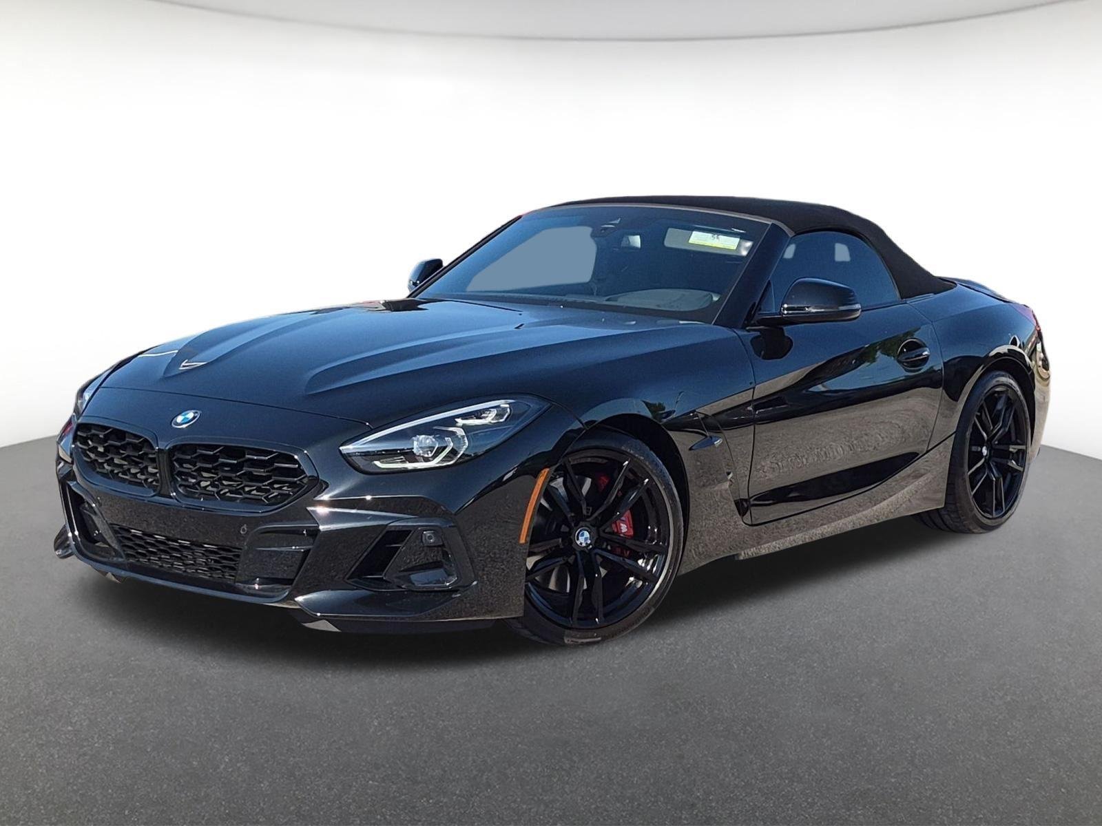 Used 2025 Black Sapphire Metallic BMW M40i image 1