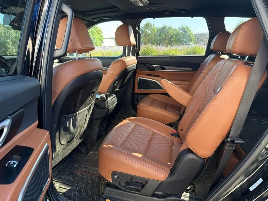 Used 2024 Ebony Black Kia EX X-Line image 11