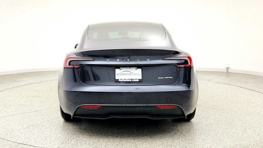 Used 2025 Stealth Grey Tesla Long Range AWD image 6