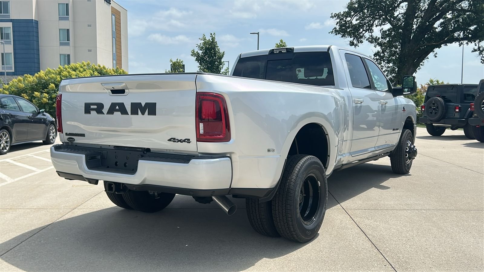 New 2026 Silver-Zynith Exterior Paint RAM Laramie image 4