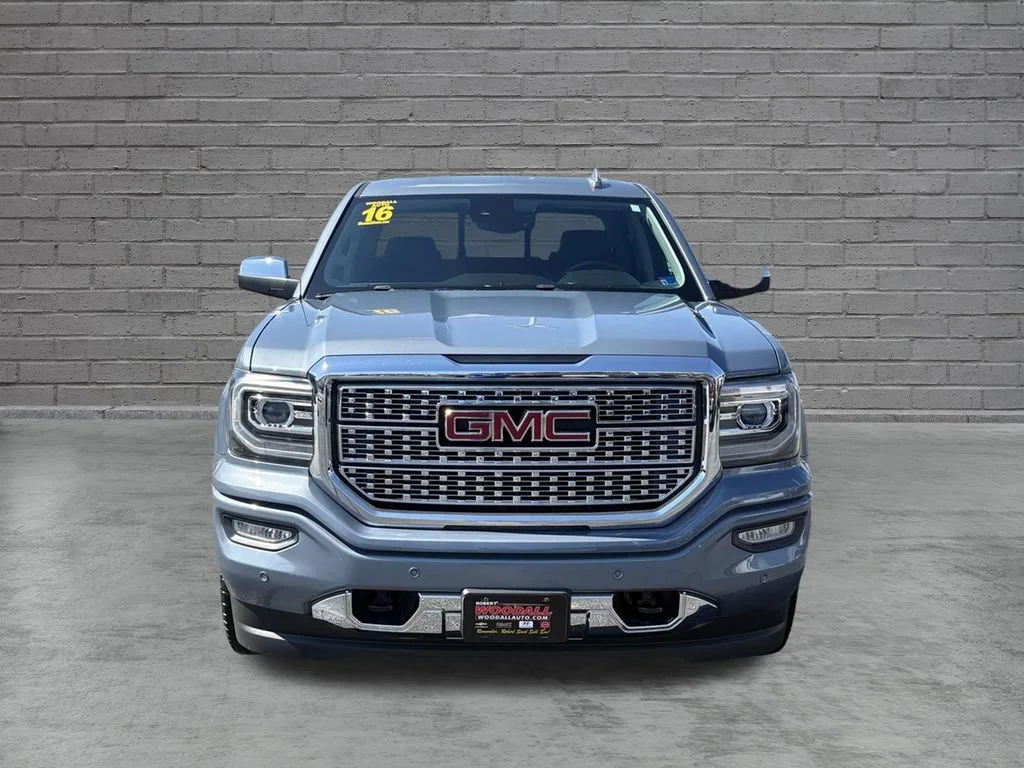 Used 2016 LIGHT STEEL GRAY METALLIC GMC Denali image 1