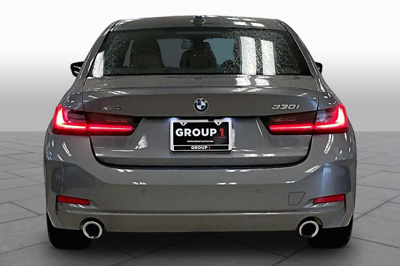 Used 2024 Skyscraper Grey Metallic BMW 330i xDrive image 4