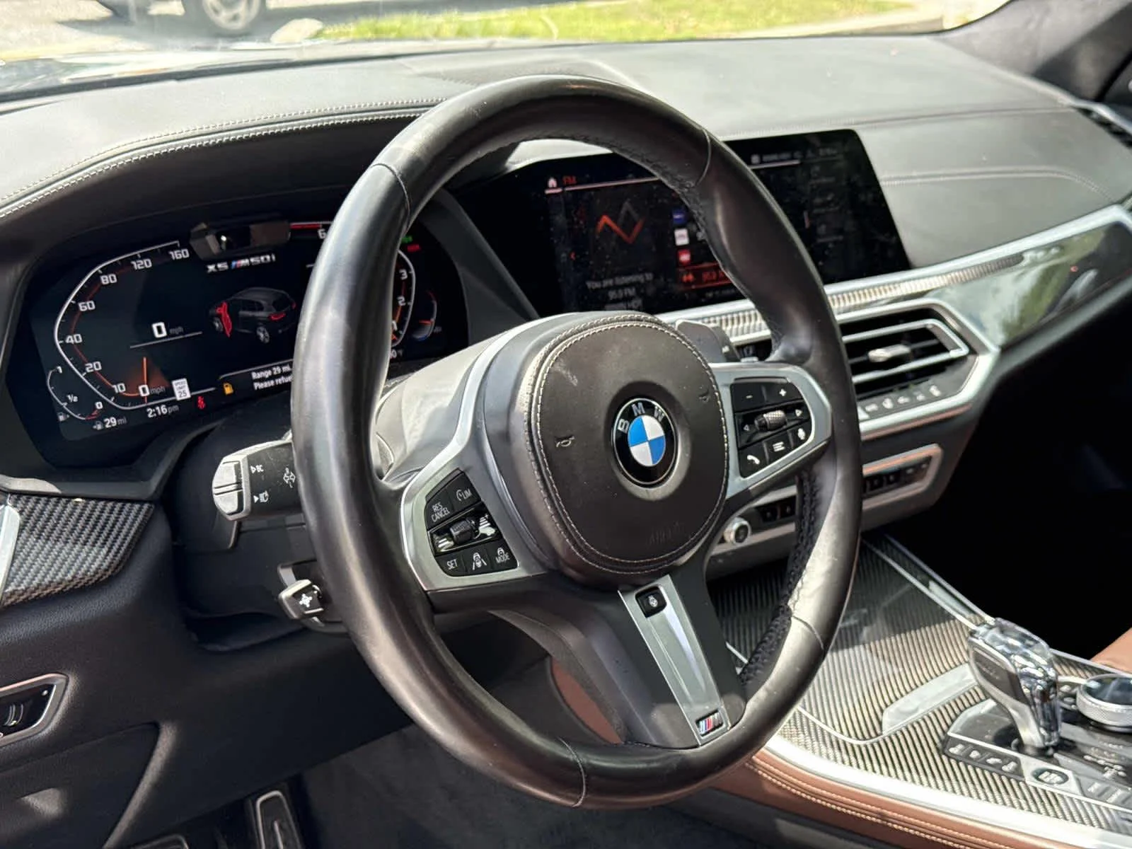 Used 2022 Tanzanite Blue II Metallic BMW M50i image 4