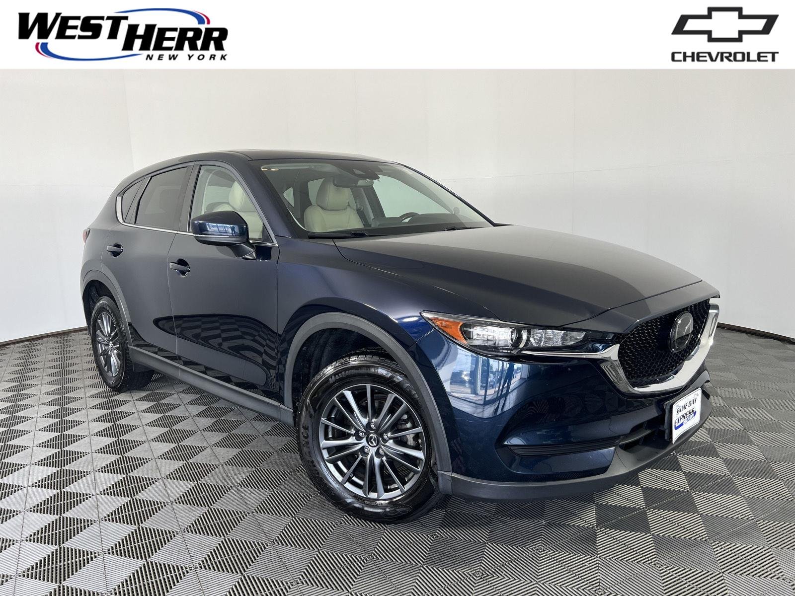 Used 2019 Deep Crystal Blue Mica Mazda Touring image 1
